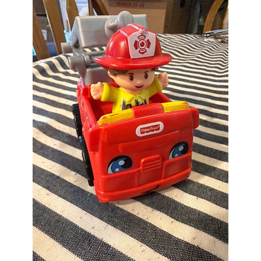 Fisher-Price Little People Fire Truck Red Vehicle with Firefighter Erika Figure